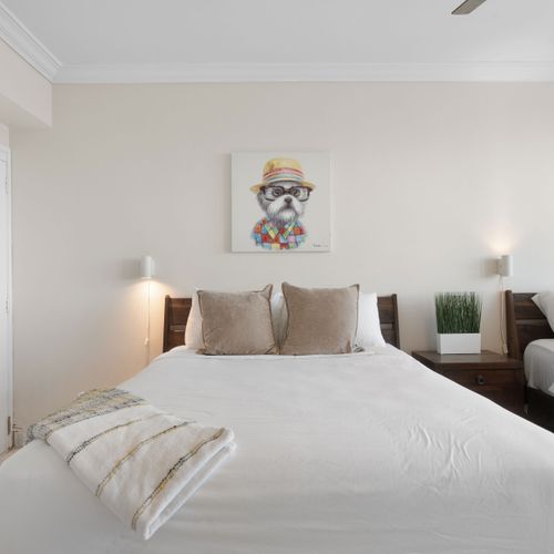 Relax in style! Our double queen room provides ample space, cozy bedding, and a refreshing coastal ambiance