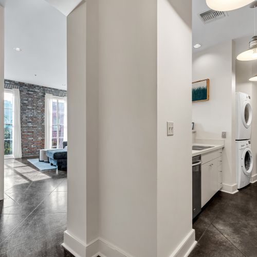 In-unit washer & dryer tucked neatly for a hassle-free stay.