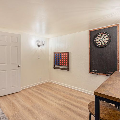 Play a round of darts or giant connect4 for some friendly competition.