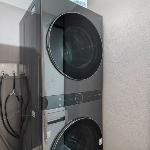 The laundry room is equipped with modern appliances, making it easy to keep your vacation gear fresh and clean throughout your stay. Enjoy the convenience of in-house laundry during your getaway!