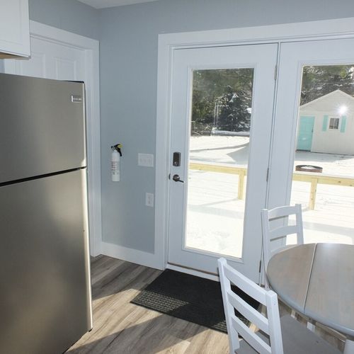 Kitchen:  there is a little 4-person dining table in the kitchen as well as a door out to the back deck from the kitchen (which works great for grilling on the deck).