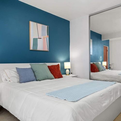 A bright and spacious room with plenty of mirrors to get ready in style.