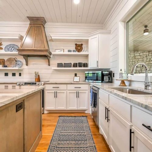 The kitchen has updated appliances and ample counter space.