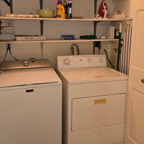 Laundry closet:  the cabin has a laundry closet with a top load washer and dryer.