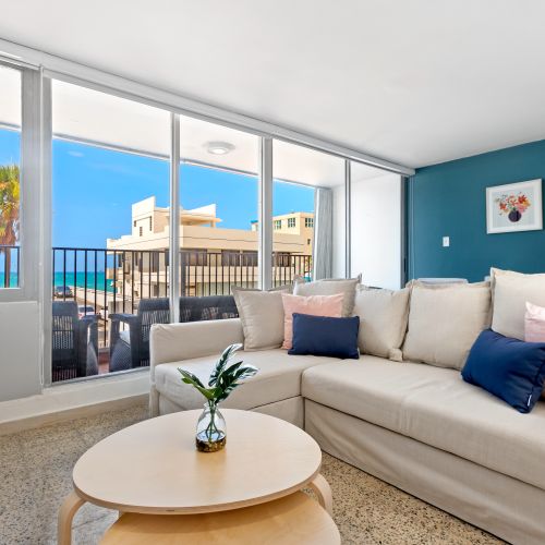 Breezy relaxation is evoked, featuring a mix of natural materials, like bamboo and wicker, and bright, tropical color schemes.