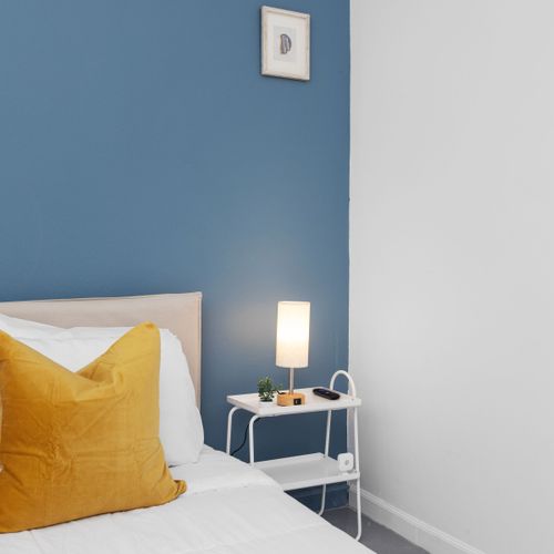 Sophisticated Comfort: Indulge in the refined luxury of this tastefully decorated bedroom, featuring plush bedding and elegant accents for an unparalleled guest experience.