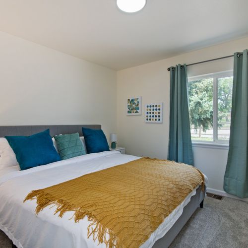 Bedroom 2 and 3 are fitted with a king-size bed, plush linens, nightstands, and plenty of space for your luggage.
