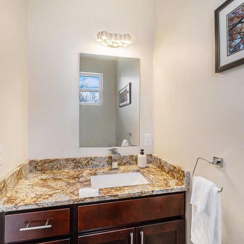 Freshen up in the half bath located on the first floor.
