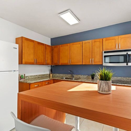 Your home away from home kitchen. This bright and practical space is fully stocked with all the essentials for a convenient and enjoyable cooking experience.