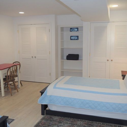 Lower level:   the large lower level basically functions as a third bedroom with 4 single beds via 2 trundle beds (i. E. 2 of the single beds roll up under the other 2 single beds). There is also a desk, two closets, two dressers, and third bathroom.