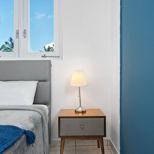 Modern renovated bedroom, huge double bed, soft bedding, bright, window views, airconditioner, modern table lamps