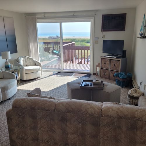 Overview: the very cute living room with a great view of lake huron!