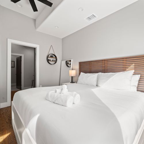 Ensuite bathroom and spacious closet in the master bedroom.