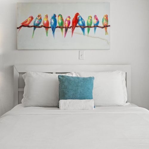 Unwind in this sophisticated oceanfront studio, featuring two plush beds and a private balcony with captivating views.