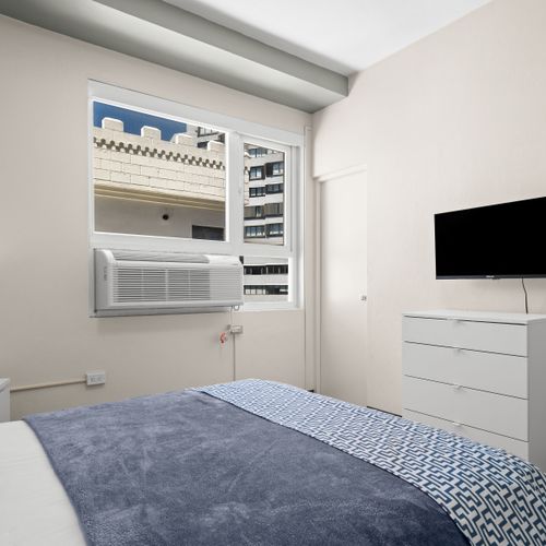 Unwind in a vibrant and comfortable space! Our bedroom offers ample room to relax, complemented by stylish decor and plenty of natural light.