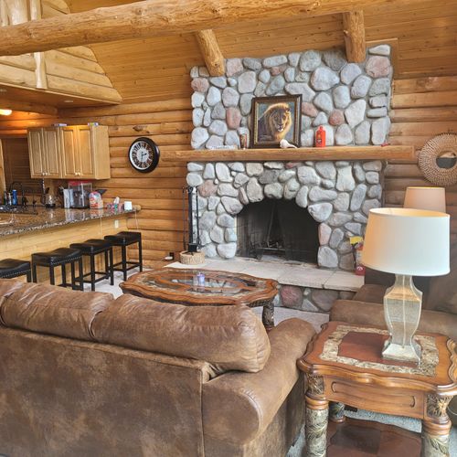 Living room:  the cute and cozy living room with an extravagant fireplace