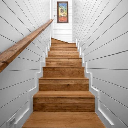 Upstairs leads to the bunk room/Queen suite.