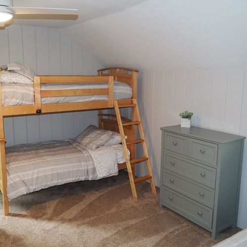 Bedroom #7 (second floor):  has two twin-on-twin bunk beds plus a separate twin bed, thus sleeping 5 people.