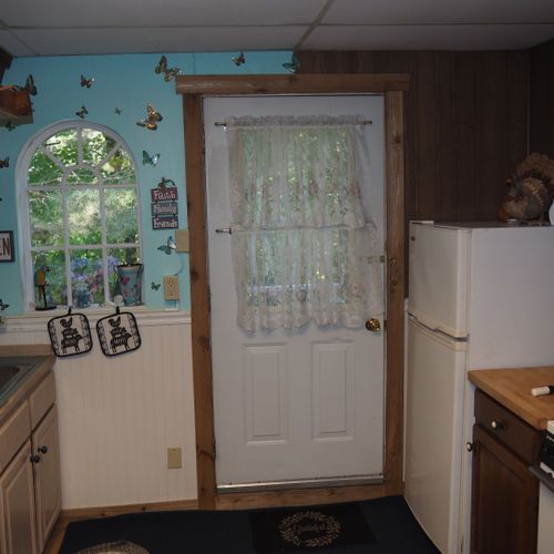 Kitchen:  full kitchen including sink, counter, cabinets, refrigerator, electric range and a good supply of cooking and dining utensils.
