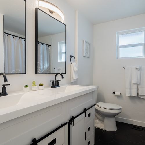Elevate your morning routine in the newly redone bathroom in the lower level–so clean and spacious!