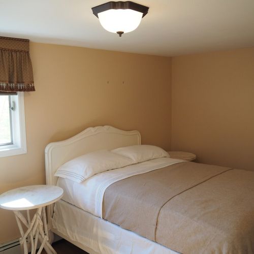 Bedroom #2:  features a full-size bed and a desk.
