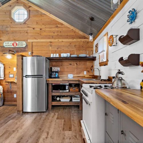 Cottage kitchen and open concept design allow for privacy from the Main House