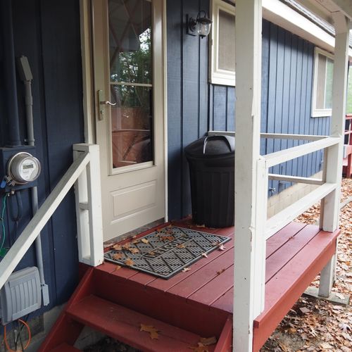 Exterior:  the main entrance, which is on the far side of the house.