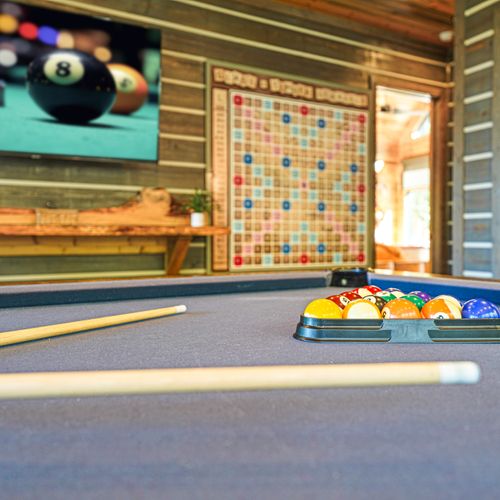 Challenge your crew to a night of friendly competition in this spacious entertainment haven.