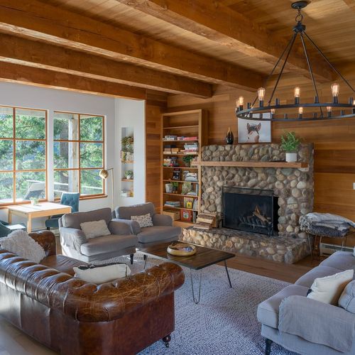 Cozy living room with a gas fireplace that warms up the whole space, perfect space for morning coffees and late-night games