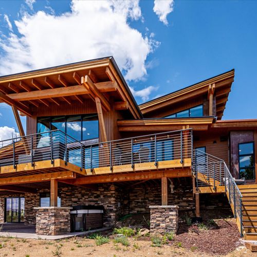 The bailey lodge stands tall with its impressive architecture and spacious wrap-around balcony.