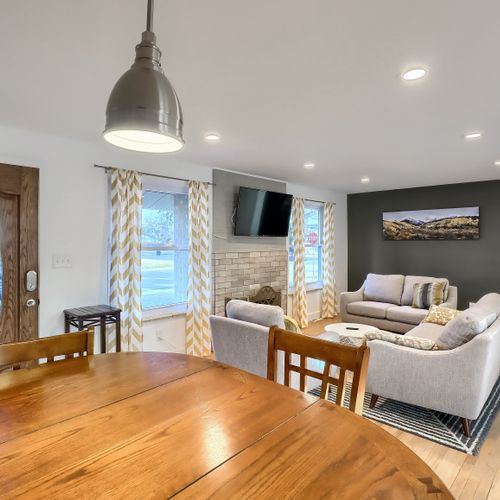 The kitchen seamlessly flows into the welcoming dining space, with seating for 4.