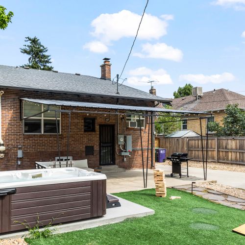 Enjoy a well-equipped patio blending outdoor fun with laid-back charm.