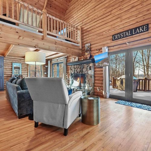 Living room:  the comfy living room with a huge wood fireplace!