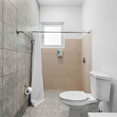 Sleek bathroom, stylish tiles.