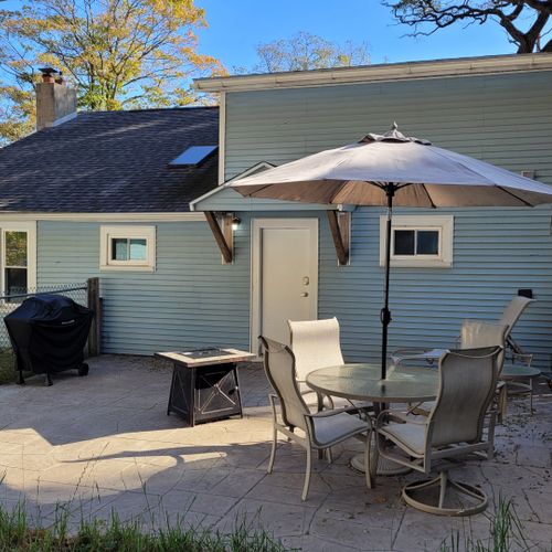 Overall:  the cute little backyard with outdoor dining, fire table, and a propane grill.
