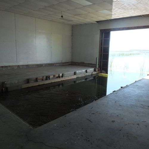 Exterior:  the interior of the boat house. (please note that the level of lake huron varies significantly. As such, the boat house may or may not be usable by boats depending upon the lake level. )