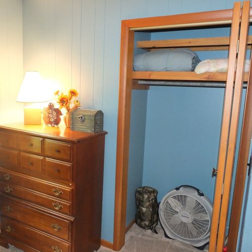 Bedroom #3:  features a trundle (i. E. 2 twin beds), a dresser, and a closet.