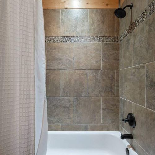 Shower/tub combo.
