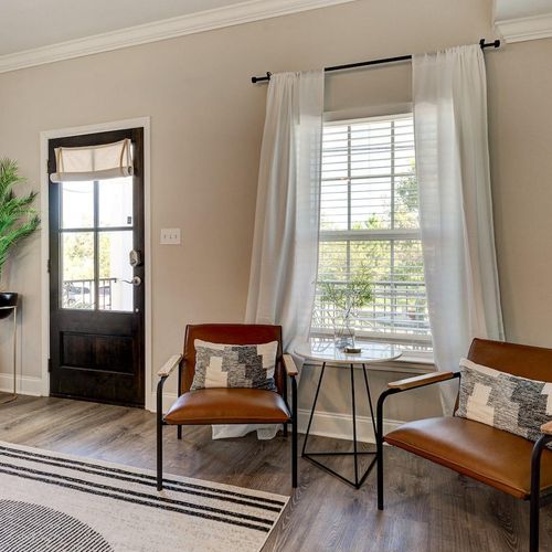 Cozy entryway nook — pull up a chair & start the morning w/ a quiet cup of coffee.