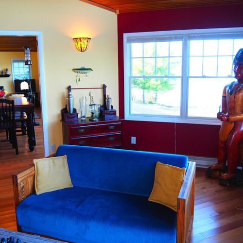 Upstairs foyer:  very cute upstairs foyer with a door out to the deck. (note that the fireplace is not for guest usage. )