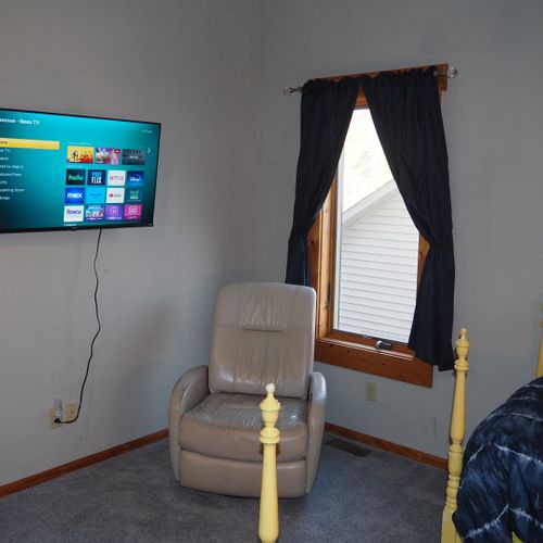 Bedroom #3 (second floor):   features 2 twin beds, private television, comfy chair, and a closet.