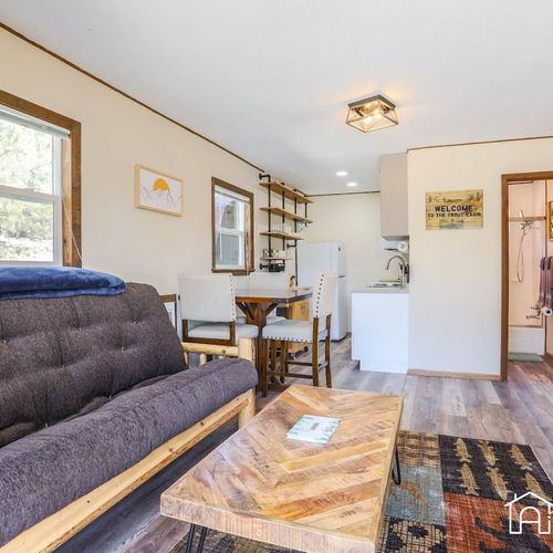 Relax in the cozy living area of this cozy retreat.
