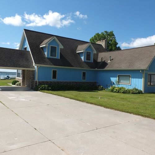 Exterior:  the front of the house (facing the road).