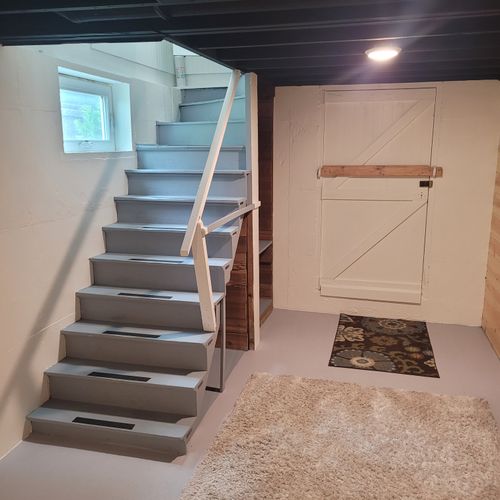 BASEMENT:  The stairs that lead to the basement.