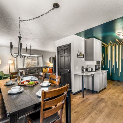 This open-concept living, kitchen, and dining area flows seamlessly.