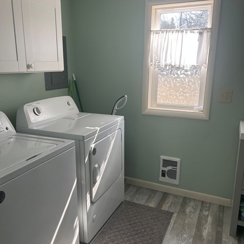 Laundry room:  convenient laundry room with a washer and dryer