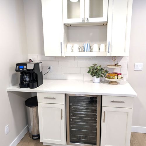 KITCHEN:  The home has a big and beautiful kitchen with all appliances including a dish washer, coffee bar, food pantry, and separate beverage cooler