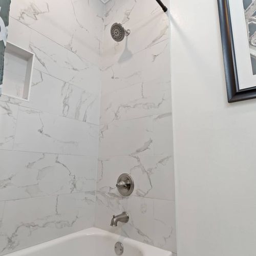 Marble-finish shower for a clean, spa-like start to your morning.