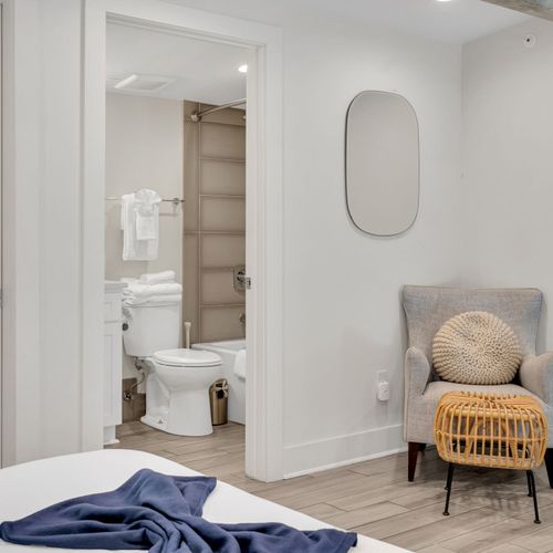 Bright, minimal bathroom w/ clean lines & a calm, spa-like feel.
