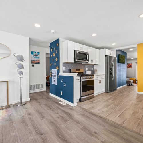 The kitchen blends style and function — modern, bright, and fully stocked